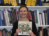 Artist: Butler, Roger | Title: Portrait of Melanie Eastburn, holding her book, Papua New Guinea Prints, Canberra, 2006 | Date: 2006