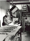 Title: Grahame King, Australian printmaker, sorting lithographs, at his studio at Warrandyte.