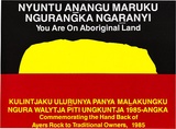 Artist: Jalak Graphics. | Title: Nyuntu anangu maruku ngurangka ngaranyi [You are on Aboriginal land] | Date: 1985 | Technique: screenprint, printed in colour, from three stencils