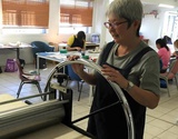 Title: Kay Watanabe, Australian printmaker, at the etching press, Brisbane, 2019.