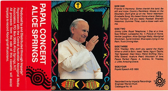 Artist: b'REDBACK GRAPHIX' | Title: b'Cassette cover: Papal Concert Alice Springs' | Date: 1980-94 | Technique: b'offset-lithograph, printed in colour, from four plates'
