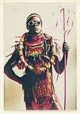 Artist: McDiarmid, David. | Title: not titled [Afro-American with spear, plain background]: postcard from the series Urban Tribalwear. | Date: (1980) | Technique: photocopy, printed in colour | Copyright: Courtesy of copyright owner, Merlene Gibson (sister)