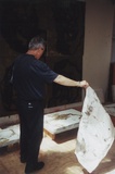 Artist: LOANE, John | Title: Mike Parr with lithographic stones Viridian Press, Olinda, Victoria.